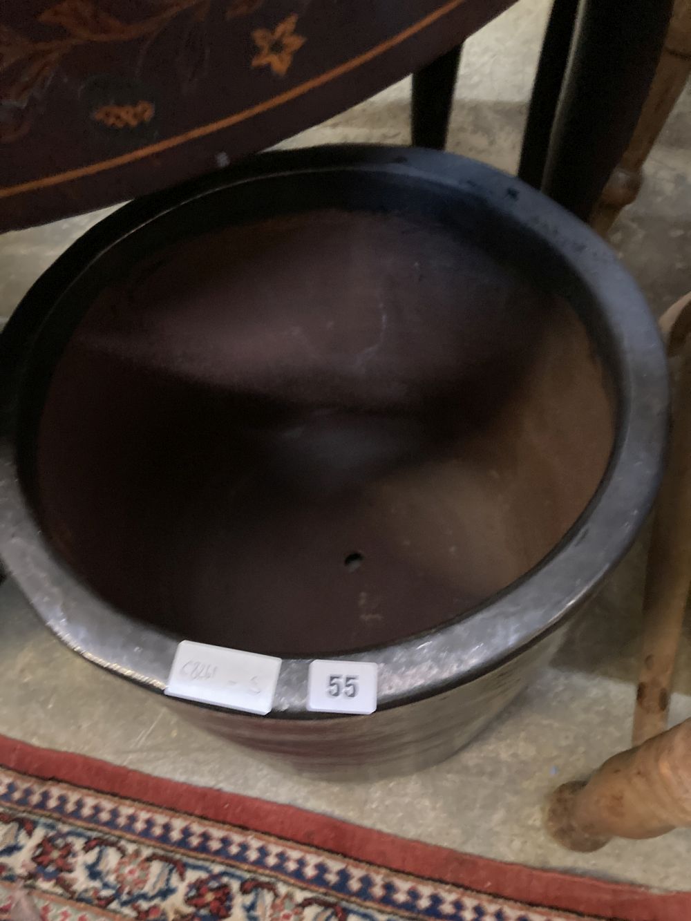 A circular glazed garden planter, height 38cm
